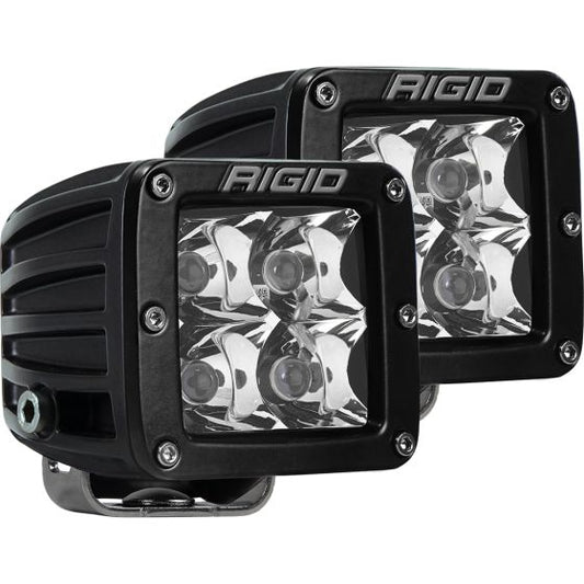 Two Rigid Industries D-Series Pro Spot Pattern Pod Lights on a white background